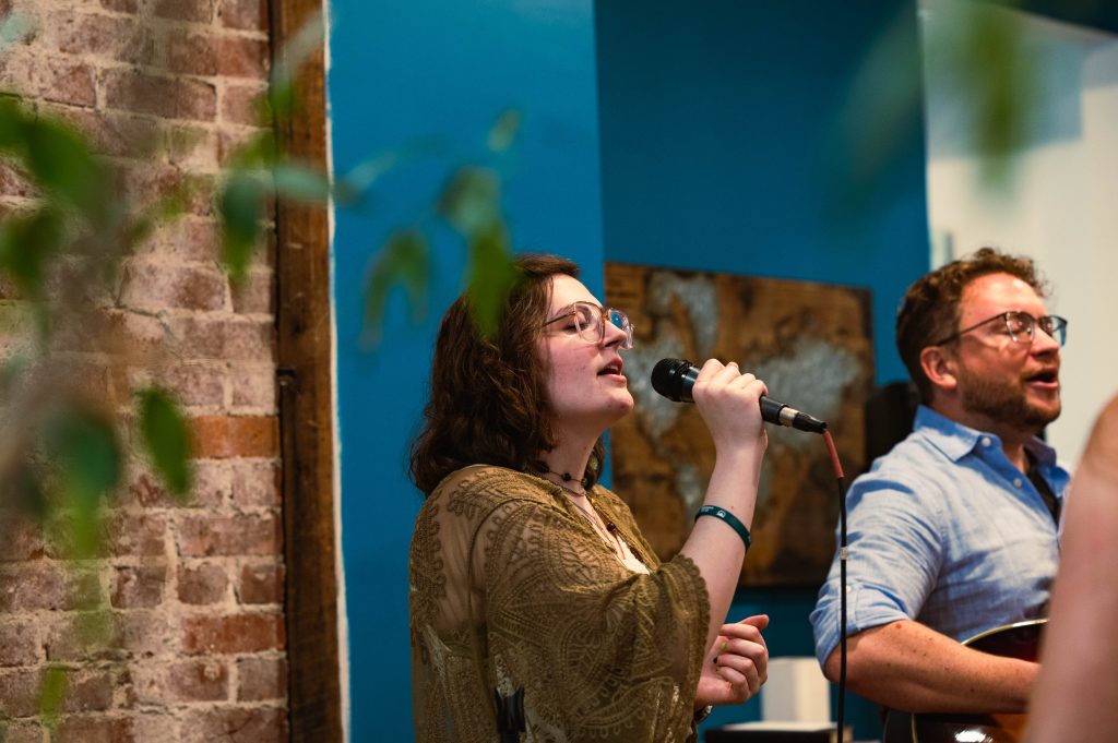 Lucy Grecu singing at The Company with Brad Pauquette